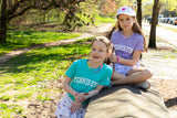 Two girls in cute tennis clothes from Love Set Match tennis wear.