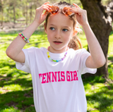 Girl wearing cute tennis t-shirt from Love Set match tennis wear.